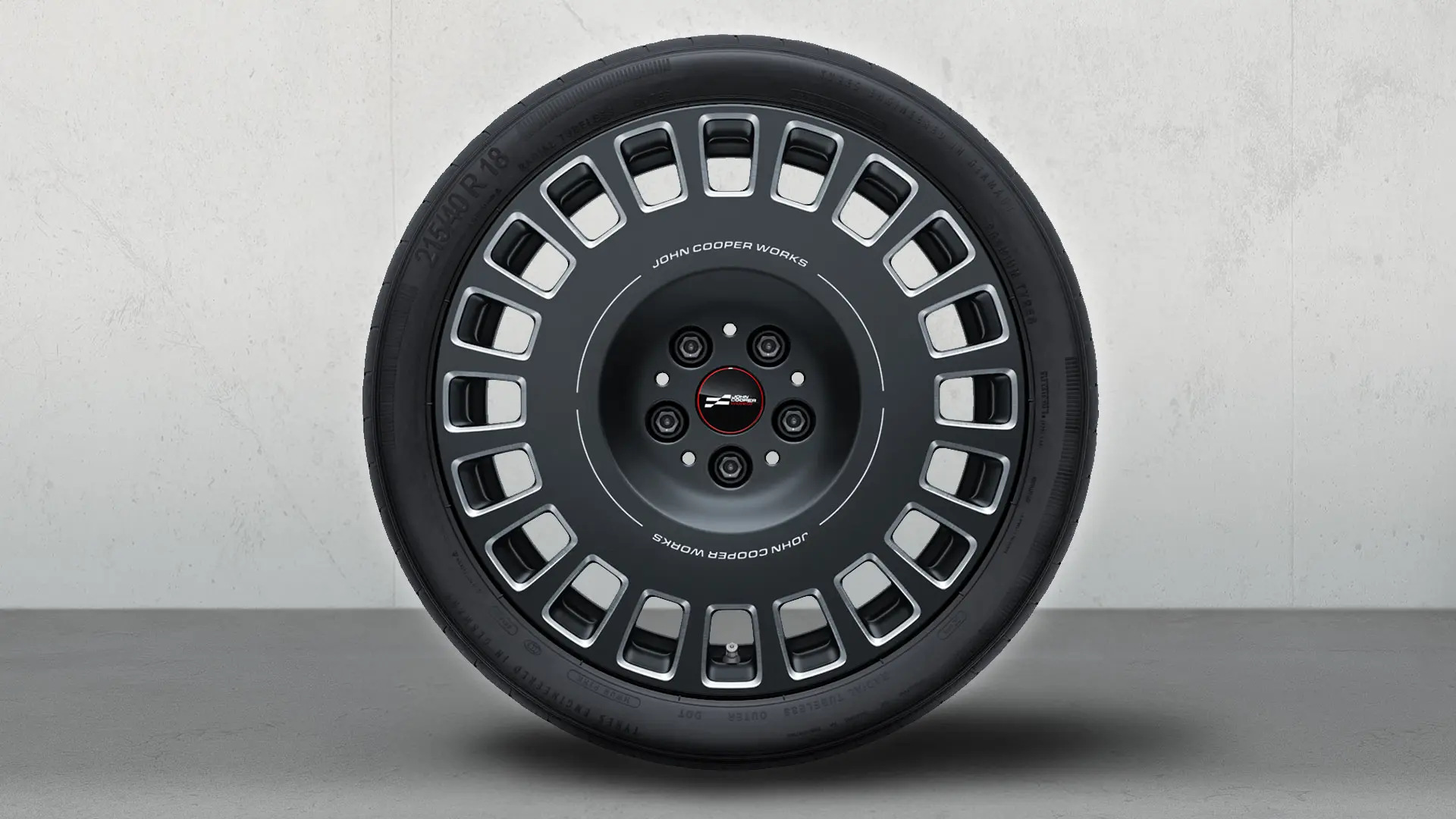 MINI 18-Zoll-Leichtmetallräder JCW Rallye Spoke 964 in Frozen Midnight Grey mit glanzgefrästem Finish.